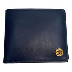 Carry All Your Daily Essentials In The Versace La Medusa Navy Blue Calf Leather Wallet. This Bifold Wallet Offers Plenty Of Space Including Two Bill Compartments And Eight Card Holder Slots. This Navy Blue Smooth Leather Wallets Slips Right In Your Pocket, Perfect For On The Go! Model: 1006116 Navy Blue Calfskin Leather Bifold Gold-Tone Hardware Iconic La Medusa Logo Two Bill Compartments Eight Card Slots Measurements: 4.5" X 3.5" Includes Authenticity Cards And Versace Box Made In Italy Luxury Blue Wallet For Formal Occasions, Designer Blue Wallet For Formal Occasions, Designer Blue Wallets For Formal Occasion, Elegant Blue Wallet With Coin Pocket, Blue Leather Wallets For Formal Occasions, Blue Leather Formal Wallets, Formal Blue Leather Wallet, Classic Blue Leather Wallet, Classic Blue Leather Wallets