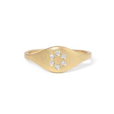 The true beauty of this ring lies in its discreet yet elegant circle of diamonds. Subtly nestled within the design, these diamonds add a touch of understated glamour, elevating your look without overwhelming it. Details: White diamonds .09tcw 14k gold Ready to ship - size 7 All other sizes are made-to-order and can take up to three weeks to ship Minimalist Diamond Cluster Ring With Round Cut, Minimalist Diamond Ring With Round Cut Accents, Cubic Zirconia Halo Ring With Single Cut Diamonds, Timeless Diamond Promise Ring With Rose Cut Diamonds, Oval Diamond Stackable Rings With Diamond Accents, Refined Rings With Diamond Accents, Refined Rings With Diamond Accents On Round Band, Halo Ring In Yellow Gold With Single Cut Diamonds, Refined Diamond Accented Band Rings