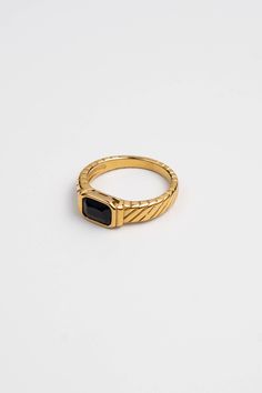 This new ring is a modern statement meant to be worn daily. Its classic combination of gold and black matches any outfit. Water Resistant 18K gold over stainless steel Hypoallergenic Made in United States Classic Black Metal Rings, Twisted Ring, Salt And Light, Gentle Fawn, Bar Ring, Black Bar, Heart Keychain, Twist Ring, Modern Ring