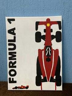 a painting of a red race car on a blue wall with the words formula written in black