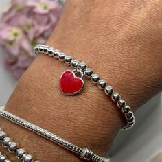 Sterling Silver Beaded Bracelet  Stunning silver beaded bracelet with a heart charm attached ( the back of the red heart is silver) ✨  This silver bead bracelet measures approximately 7 inch in length and fastens with a lobster clasp.  This beaded bracelet will come inside a gift bag and sent with proof of postage  Please take a quick look in my shop as there is lots to see www.Etsy.com/uk/shop/HayleyAccessories  Have a great day! Uk Seller Free p&p First Class  Silver Bracelet, Heart Bracelet, Charm Bracelet, Bracelet for Women, Gift for Her, Valentines Gift, Birthday Gift, Minimalist Bracelet, Beaded Bracelet Silver Beaded Charm Bracelet With Heart Shape, Silver Beaded Heart Charm Bracelet, Silver Beaded Heart-shaped Charm Bracelet, Silver Heart-shaped Beaded Charm Bracelet, Gift Bangle Heart Bracelet With Jubilee Detail, Silver Beaded Heart-shaped Bracelets, Heart-shaped Silver Beaded Bracelets, Silver Beaded Heart Bracelet, Dainty Bracelet With Heart Charm And Round Beads