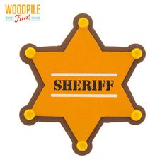 an orange sheriff badge with the word sheriff on it