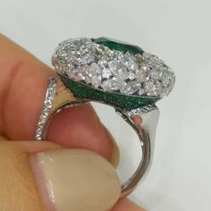 For Sale on 1stDibs - Emerald 3.70 Carat Diamonds Emeralds 18 Karat White Gold Ring What could be more elegant than a combination of cold 18 Karat White Gold, Diamonds and a Luxury Platinum Cluster Emerald Ring, Formal Platinum Emerald Ring With Pave Setting, Luxury Emerald Ring With Diamond, Formal Emerald Ring With Pave Diamond Setting, Formal Emerald Diamond Ring With Pave Setting, Luxury Cluster Emerald Ring With Diamonds, Round Emerald Ring With Pave Diamond Setting, Luxury Silver Emerald Ring With Brilliant Cut, Luxury Silver Emerald Ring With Pave Setting