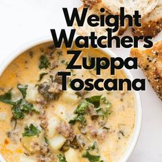 a bowl of soup with bread on the side and text overlay that reads weight watchers zupa toscana