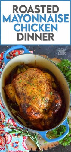 roasted mayonnaise chicken dinner in a blue dutch oven with herbs on the side