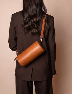 Model with Izzy bag in cognac classic leather