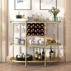 there is a wine rack with bottles and glasses on it