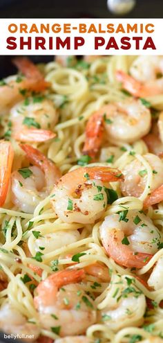 an image of shrimp pasta with carrots and parmesan cheese on the side