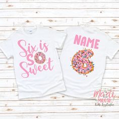 two t - shirts with donuts on them and the number three in pink