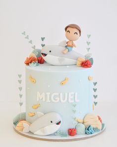 there is a cake with a boy on it