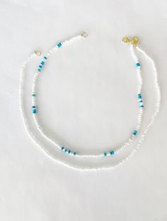 Set of two or individual seed bead necklaces!  Choose the white necklace ,  the Ocean necklace,  or both! Excellent quality  Fast shipping  Unique designs   24 k gold plated clasps Buy this for yourself,  a gift, an athletic team , or for a party favor Pair this with any other item on our Etsy! Instagram @Braceletsbycarrie