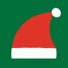 a red and white santa hat on a green background