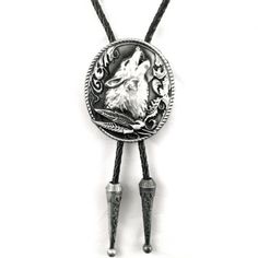 Embrace the untamed beauty of the American Southwest with our Howling Wolf Bolo Tie, a traditional Western accessory that adds a stylish touch to any cowboy look. Crafted with braided leather cords and zinc alloy accents, this 38" (96cm) bolo tie features a pendant measuring 1.6" (4cm) x 2" (5cm), adorned with a striking howling wolf head.  Designed for both style and comfort, this bolo tie features a slider clasp for easy adjustment, ensuring a perfect fit every time. Whether you're exploring t Western Style Adjustable Jewelry For Western-themed Events, Western Jewelry With Adjustable Length For Western-themed Events, Western Jewelry With Adjustable Length For Rodeo, Adjustable Cord Jewelry For Western-themed Events, Western Bolo Ties With Adjustable Length, Western Style Adjustable Bolo Ties, Western Style Necklace With Adjustable Cord, Western Style Festival Bolo Tie, Bohemian Bolo Tie For Rodeo