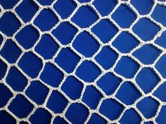 a blue and white net is shown in close up