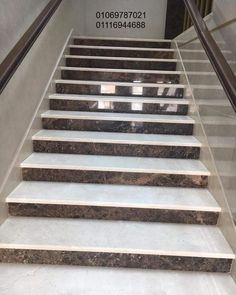 marble stairs leading up to the second floor