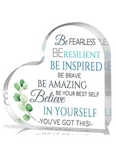 a heart shaped glass plaque with the words be fearless