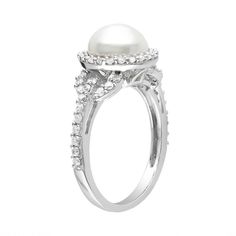 Exquisite elegance. A freshwater cultured pearl framed by cubic zirconia stones gives this ring stunning beauty. Add a sophisticated touch to any ensemble when you wear this sterling silver ring. Exquisite elegance. A freshwater cultured pearl framed by cubic zirconia stones gives this ring stunning beauty. Add a sophisticated touch to any ensemble when you wear this sterling silver ring. Cubic zirconia stones accenting the band add extra sparkle. 8.5-9-mm cultured pearl .45-in. width Metal: ste Right Hand Rings, Cubic Zirconia Rings, Vintage Style Outfits, Sterling Silver Ring, Fresh Water, Silver Ring, Sterling Silver Rings, Cubic Zirconia, Jewelry Rings