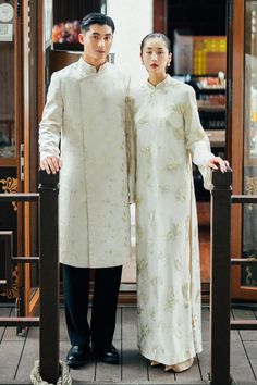 This elegant Ao Dai showcases the traditional beauty of Vietnam. Made from high-quality silk organza, its trapezoid shape and side slits offer effortless movement and comfort. Embrace the luxurious feel of this floor-length Ao Dai on any special occasion. Length:- Ao Dai: 125cm/130cm/135cm (S/M/L)- Pants: 100cm/104cm/108cm (S/M/L) Material: Organza (Outer layer); Synthetic Silk (Inner layer; Pants) *Including pants of the same color as the photo. Organza Outer, Trapezoid Shape, Traditional Beauty, Mean Blvd, Organza Fabric, Silk Organza, Wedding Board, Wide Sleeves, Designer Collection