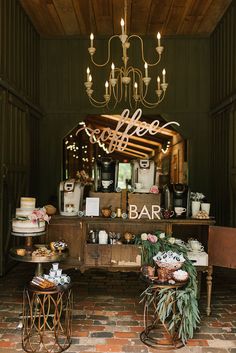 an old fashioned bar is decorated with flowers, candles and other things to drink at