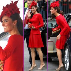 a woman in a red dress waves to the crowd