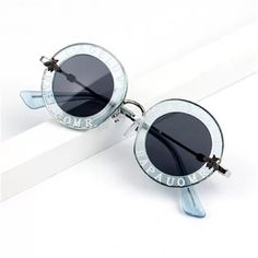 Unisex Playful Blue Sunglasses For Party, Playful Blue Party Sunglasses, Trendy Light Blue Sunglasses With Gradient Lenses, Cute Summer Sunglasses With Glass Material, Cute Glass Sunglasses For Summer, Blue Plastic Sunglasses For Summer, Cute Blue Sunglasses For Summer, Trendy Light Blue Tinted Sunglasses, Fun Blue Sunglasses For Summer