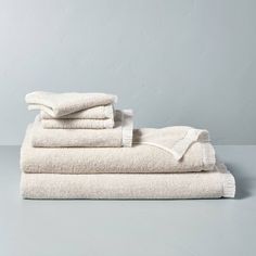 three folded towels stacked on top of each other