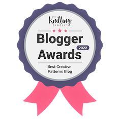 a badge with the words blogger awards on it and a pink ribbon around it that says best creative pattern blog