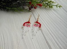 Handmade Festive Earrings For Christmas, Christmas White Beaded Dangle Earrings, White Christmas Beaded Dangle Earrings, White Beaded Christmas Dangle Earrings, Handmade Beaded Earrings For Christmas Holiday, Handmade Beaded Earrings For Christmas, Handmade White Beaded Earrings For Christmas, White Beaded Earrings For Christmas, White Beaded Dangle Earrings For Christmas