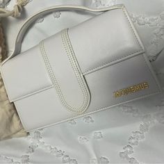 J’s Handbag Size 23.5cmx13cm 100%Leather Made In Italy Never Used Designer White Baguette Bag For Shopping, Designer White Baguette Bag, White Clutch Flap Bag With Dust Bag, Chic White Baguette Bag For Shopping, White Everyday Baguette Bag With Top Carry Handle, White Baguette Bag With Dust Bag For Evening, Everyday White Baguette Bag With Top Handle, White Handheld Baguette Bag With Detachable Strap, Luxury White Baguette Bag With Removable Pouch