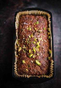 pistachio loaf cake in a pan on a table