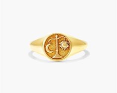 14K Yellow Gold Libra Zodiac Signet Ring. Libra is symbolized by the scale which represents equality, balance and justice. Harmony will always be a priority for the fair minded Libra. Inspired by mythological imagery, our Zodiac Signet Ring collection is the perfect talisman to channel this energy. Libra Signet Ring, Family Signet Ring, Libra Ring, Aries And Libra, Zodiac Rings, Locket Bracelet, Libra Zodiac, Ring Collection, Jewelry Essentials