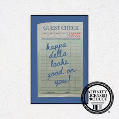 a piece of paper with the words guest check written on it and a rubber stamp that says kapa delta looks good on you