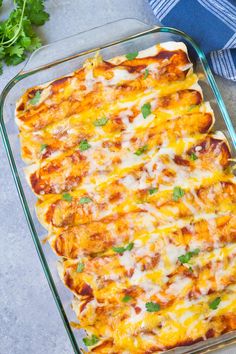 a casserole dish with cheese and herbs