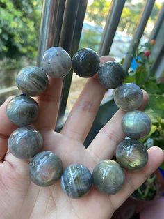 Material:Labradorite beads size :Approx 20mm   quantity: one strand  6mm approx 29 pcs one strands 7mm approx25 pcs one strands 8mm approx 22 pcs one strands 9mm approx 21pcs one strands 10mm approx 19 pcs one strands 11mm approx 18pcs one strands 12mm approx 16 pcs one strands 13mm approx 16 pcs one strands 14mm approx 15 pcs one strands 15mm approx 14pcs one strands 16mm approx 14 pcs one strands 17mm approx 13pcs one strands 18mm approx 13pcs one strands 19mm approx 12pcs one strands 20mm app Labradorite Bead Jewelry As A Gift, Labradorite Beaded Jewelry As A Gift, Gift Labradorite Jewelry With Polished Beads, Gray Round Beads Spiritual Jewelry, Handmade Moonstone Bracelets, Gray Spiritual Round Bead Jewelry, Moonstone Beaded Bracelets For Healing, Round Spiritual Labradorite Bracelet, Round Moonstone Beaded Bracelets As Gift