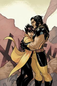 a man and woman hugging in front of a rock formation with the words x - men written on it