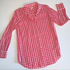 This Has Never Been Worn, Though The Tags Have Been Removed. It's A Pink/Red Gingham (More Pink Than Red) Casual Gingham Blouse For Daywear, Gingham Button-up Tops For Daywear, Gingham Tops With Button Closure And Relaxed Fit, Relaxed Fit Gingham Tops With Button Closure, Casual Gingham Tops With Buttons, Plaid Button-up Spring Blouse, Casual Gingham Top With Button Closure, Casual Gingham Shirt For Daywear, Preppy Gingham Button-up Shirt