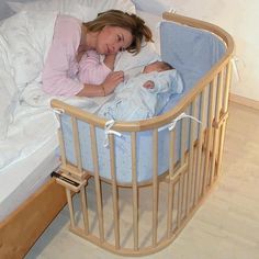 the baby is sleeping in her crib