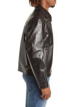 Thick and heavy cowhide leather means lasting style in this sleek racer jacket boasting a soft plaid lining and brassy goldtone hardware on the side buckles. 25 1/2" length Spread collar Zip cuffs Lined Leather Professional leather clean Made in the USA Classic Leather-lined Biker Jacket For Business, Classic Biker Jacket With Padded Collar, Racer Jacket, Leather Cleaning, On The Side, Cowhide Leather, Leather Jacket, Nordstrom, Sleek