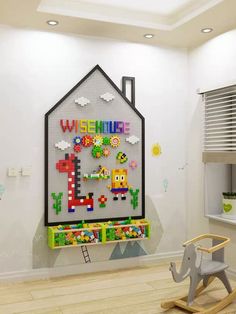 a room with a rocking chair and a lego house on the wall