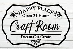 happy place open 24 hours craft room sign on a white wooden wall with black lettering