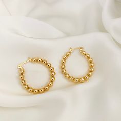 ⭐️Item Description: Size: 35 x 5mm Material: 18K Gold Filled Benefits: Water & Tarnish Resistant, Hypoallergenic ⭐️About Our Hoops: Our hoop collection ranges in shape, size, and design in order to effectively draw attention to the beautiful features of your face. They have the power of making you feel stylish, powerful, and daring in all types of outfit ⭐️Guide to a More Flattering Look: - Huggies & Small Hoops Under 20mm: These are excellent for a causal everyday wear. They are subtle Engraved Earrings, Medium Hoop Earrings, Gold Filled Hoops, Beaded Hoop Earrings, Beaded Hoops, Hypoallergenic Earrings, Sterling Silver Hoops, Gold Hoops, Everyday Jewelry