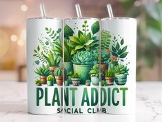 two white mugs with plants on them and the words plant adict in green lettering