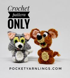 two small crocheted animals sitting next to each other