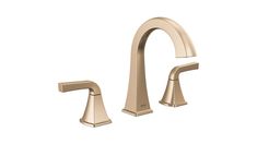 a faucet with two handles in brushed brass