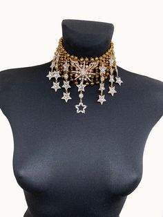 Rhinestone statement choker necklace made up of in crystal beads  gold color, rhinestones star , which gives a chic shine factor The deep gold color of the necklace and the clears  in stars will add mystery and radiance to your look. Fixed on the neck with a clasp Will compliment many different outfits Looks especially gorgeous on an open neck Lot only necklace Please note - all sales in my store are final and not for return Gold Necklace Bridal, Bridal Choker Necklace, Star Necklace Gold, Bridal Choker, Fashion Corner, Crystal Fashion, Necklace Bridal, Statement Choker, Statement Choker Necklace