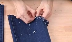 This is a guide to fraying jeans in different ways. Learn how to fray jeans to make them more on-trend, with these simple DIY techniques. How To Fray Bottom Of Jeans, Diy Jeans Refashion, Frayed Bottom Jeans