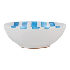 a white bowl with blue stripes on it