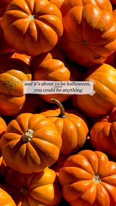 a pile of orange pumpkins sitting next to each other with a quote on it