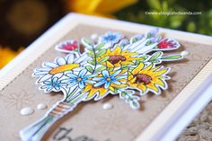 a close up of a card with flowers on it