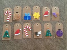 christmas themed earrings are displayed on brown tags